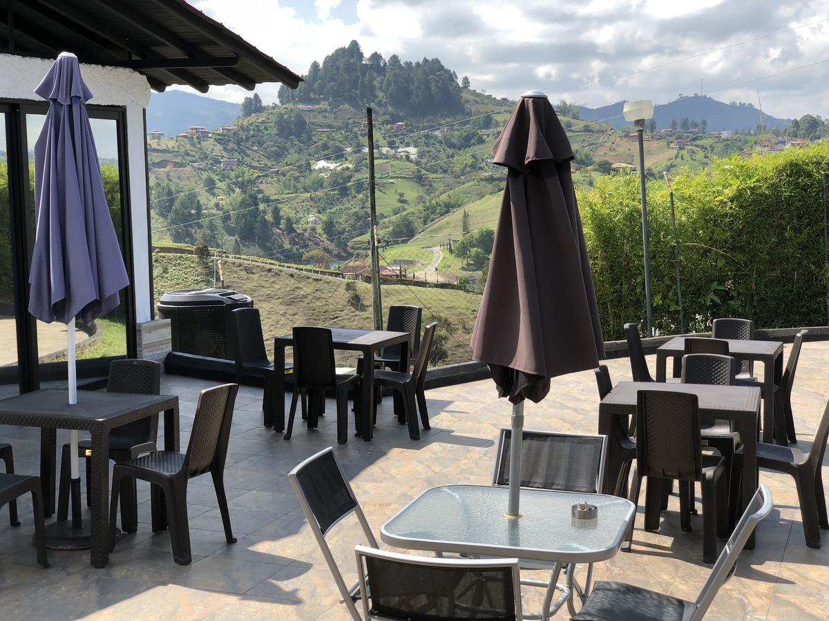 Happy Buddha Hostel & Lodge Guatape Exterior photo