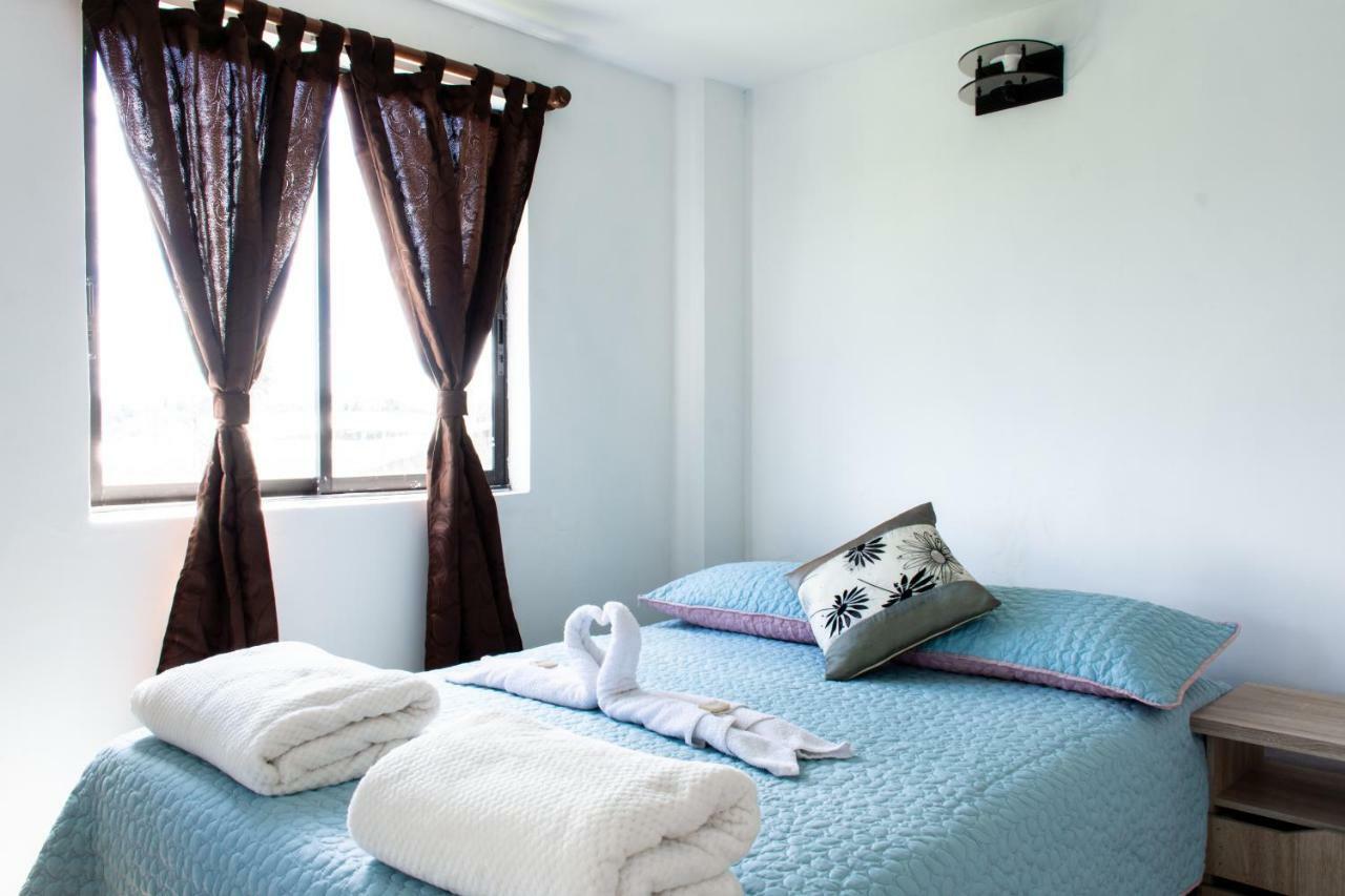 Happy Buddha Hostel & Lodge Guatape Exterior photo